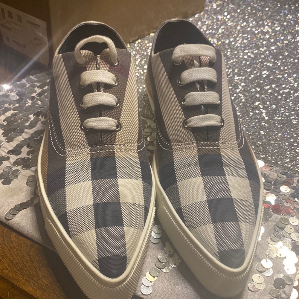 Burberry tennis shoes with point . Worn 3 times with box .